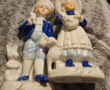 2 Small Blue and White Figures