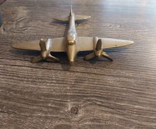 Vintage brass airplane