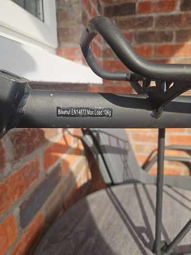 Carrier for bicycle with rear suspension