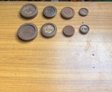 8 old scales weighs