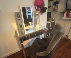 Mirrored vanity table with matching chair