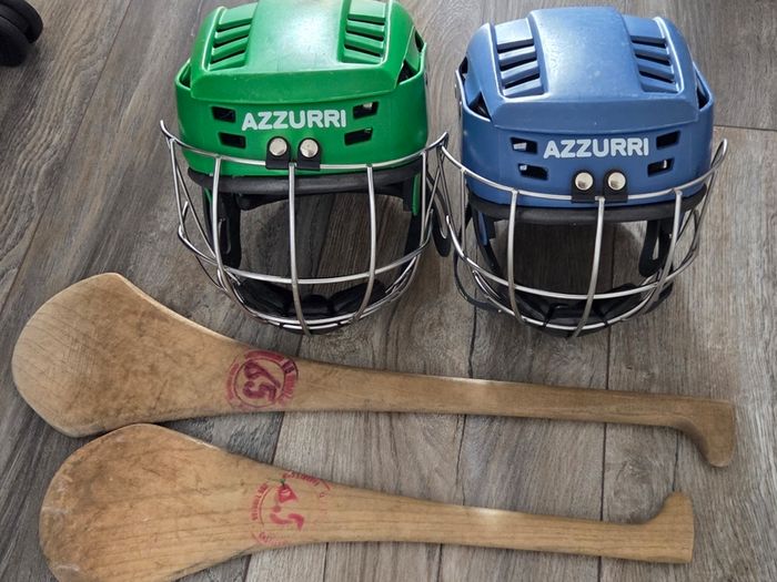 Hurling helmet and hurls