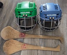Hurling helmet and hurls