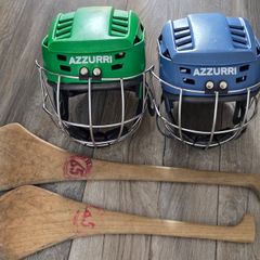 Hurling helmet and hurls