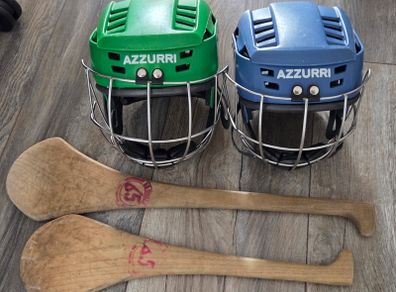 Hurling helmet and hurls