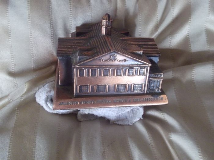a vintage saving money box for arlington height federal savings