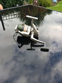 fishing reel. Quantum mach 2 .