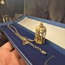 Vintage gilded bird cage with a bird pendant. Image 7