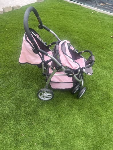 pink twin pram for dolls