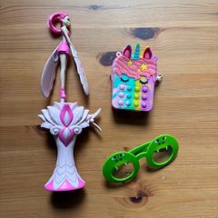 Assorted toys including Flying Fairy, Unicorn wallet, Frog Glasses
