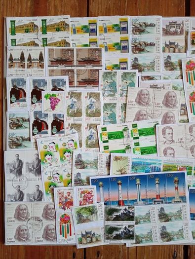 Stamps - A collection of 329 colourful Chinese stamps.