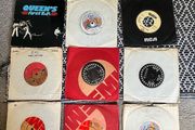 11x Queen 7" singles