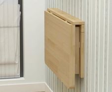 Wall mounted folding table