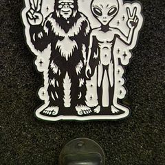 Bigfoot / alien, pin back badge.