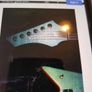 Chapman Guitars Ghost Fret Flame Blue Explorer. Image 2