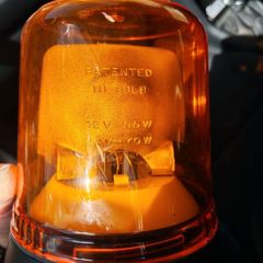 Lap rotating orange beacon