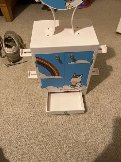 Gaming locker to hold headsets, remote controllers, up to 10 games, with drawer for cables etc