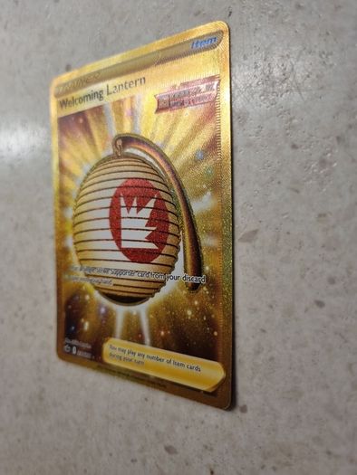 Welcoming Latern Gold Secret Rare Trainer Pokemon Card