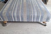 Stylish Upholstered Footstool, Ottoman on Castors