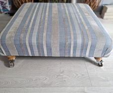 Stylish Upholstered Footstool, Ottoman on Castors
