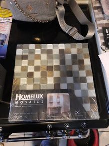 sheet of stone and glass mosaic tiles