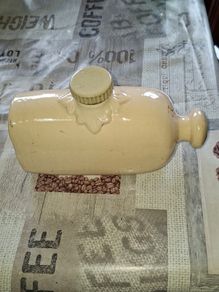 Vintage Cream-Glazed Stoneware Hot Water Bottle, commonly used as a bed or foot warmer during the 19th. Postage Available or Collection