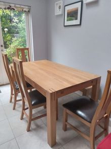 solid oak dining table and 4 chairs