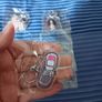 Bundle x 9 Olivia Rodrigo You Seem Pretty Sad For A Girl So In Love Keyrings. Available Separately. Image 8