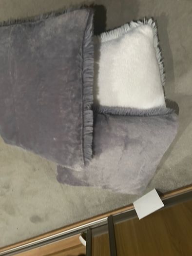 3 fluffy cushions