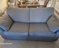 Two Light Grey  3  Seater Sofas + 2 Footstools