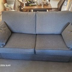 Two Light Grey  3  Seater Sofas + 2 Footstools