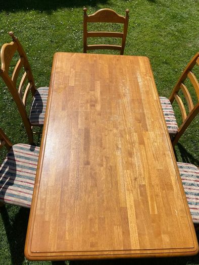 Solid table and 6 chairs. Good condition