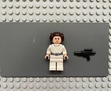 Lego Star Wars sw0994 Princess Leia minifigure- White Dress, Detailed Belt with 3 Emblems, White Legs, Lopsided Grin / Angry Open Mouth Scowl