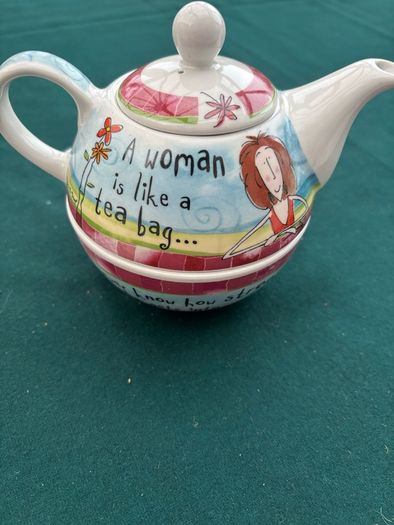 A Ceramic One Cup Teapot.