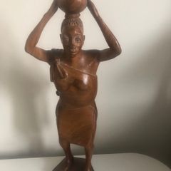 wood carving of a woman