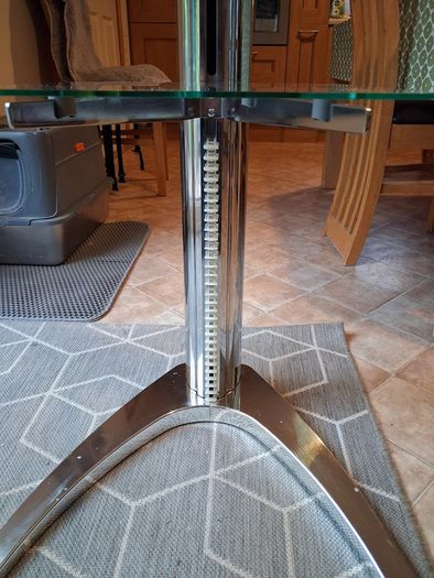 glass and chrome stand