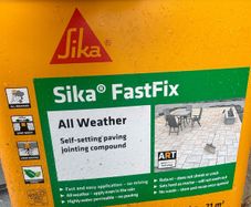 Dark Buff Sika jointing paving compound one half tub with one sealed bag