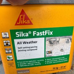 Dark Buff Sika jointing paving compound one half tub with one sealed bag