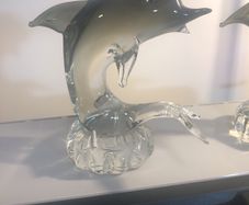 2 glass Dolphins