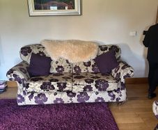 Two three seater sofa and two wingback chairs