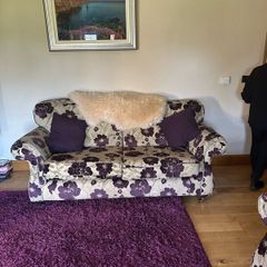 Two three seater sofa and two wingback chairs