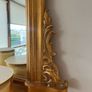 Gold mirror over mantle Image 2
