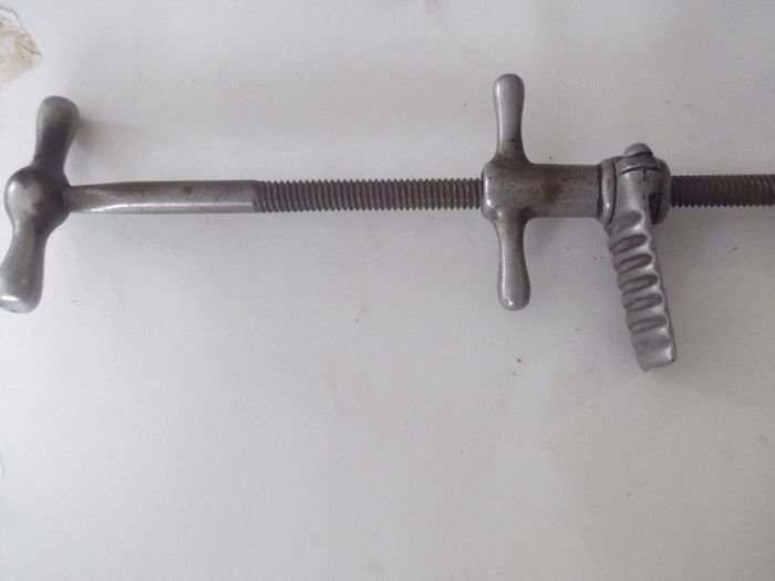 a antique steel adjustable shue stretcher