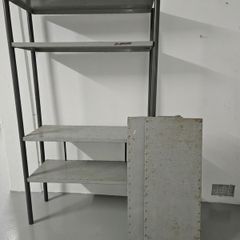 Metal shelving unit with 2 spare shelves.  1ll