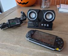 Sony PSP Bundle - PSP 1000 console (jailbroken Pro-C 6.61), iSound Audio Dock, Sony charger, 4GB mem card, Grand Theft Auto game