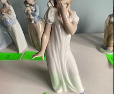 Reduced selection of Nao by Lladro figurenes