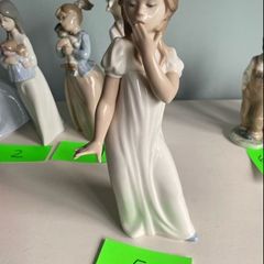 Reduced selection of Nao by Lladro figurenes