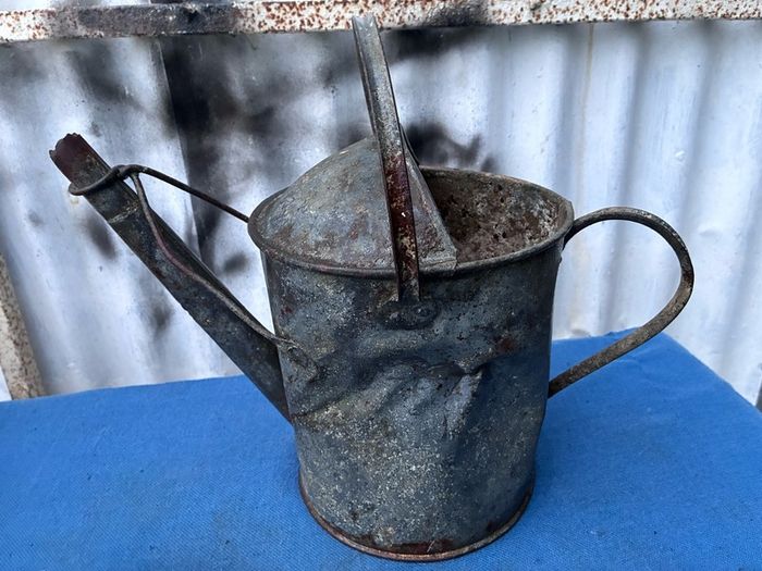 Vintage galvanised watering can