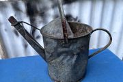 Vintage galvanised watering can