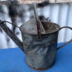 Vintage galvanised watering can